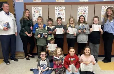 Pictured are Monongahela Rotarians Tom Graney, far left, and Deb Mangino, far right, and Kelli Schmeltz with her third-grade class at Ringgold Elementary North (Photo courtesy of the Rotary Club of Monongahela)