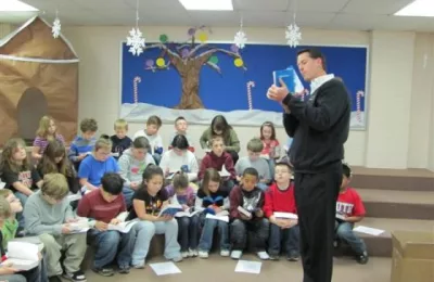 Henderson County schools get dictionaries from Rotary Club