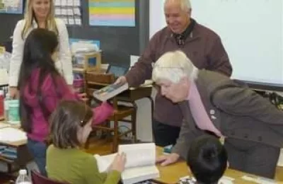 Plainfield Rotary Club presents dictionaries to third-grade students